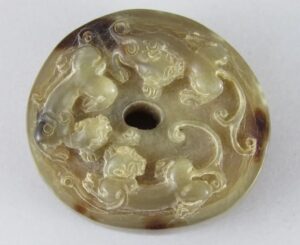 Antique chinese carved sculpture made in ox horn depicting 3 chinese mythological dragons.