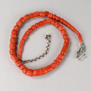 Necklace with antique coral beads from the Hadramawt region of Yemen and adjustable silver extension chain.